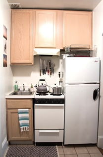 设计公司冰箱设计方案图[长条形厨房如何设计冰箱位置]